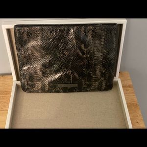 Snake skin brown black clutch